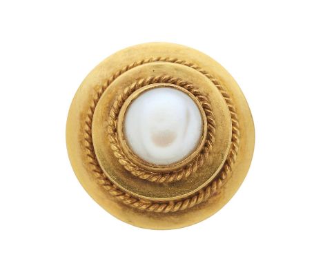 An 18ct gold mabe pearl single-stone dress ring, with rope-twist accent concentric stepped surround, stamped 18, partially in