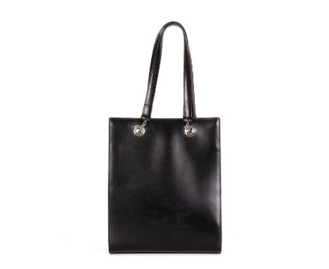 Cartier, a small Panthere tote, featuring a smooth black leather exterior, polished silver-tone hardware, dual leather and ch