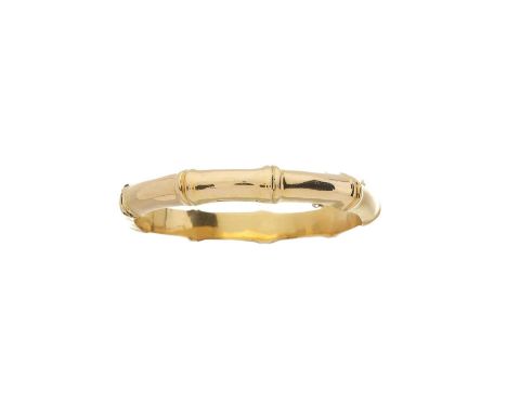 An 18ct gold hinged bangle bracelet, designed as a stylised bamboo branch, inner diameter 5.5cm, 25.7gOverall good conditionS