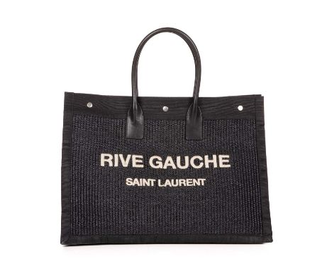 Saint Laurent, a Noe shopping tote, crafted from black woven raffia with black canvas trim, featuring 'Rive Gauche' embroider