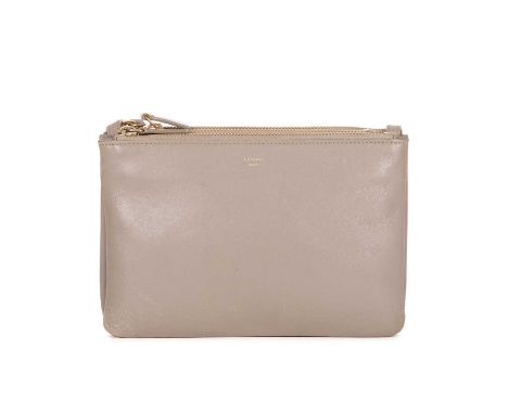 Celine, a Trio handbag, crafted from smooth grey leather, designed as three separate pouches attached by snap button fastenin