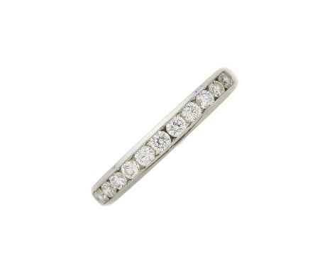 Tiffany &amp; Co., a platinum brilliant-cut diamond half eternity ring, with slightly tapered band, signed Tiffany &amp; Co.,