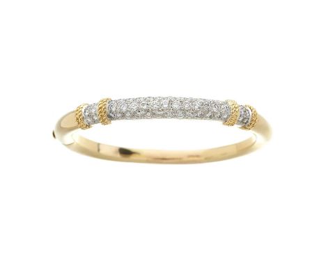 An 18ct gold pave-set diamond hinged bangle bracelet, with rope-twist double overlay highlight, estimated total diamond weigh