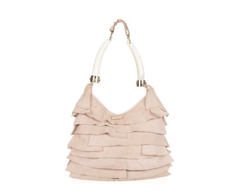 Yves Saint Laurent, a St.Tropez Ruffle handbag, crafted from layers of cream suede to create a ruffle effect to the exterior,
