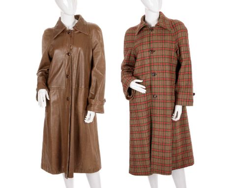 Gucci, a ladies reversible leather/tweed coat, designed with a smooth tan leather exterior, with red and green tartan reversi