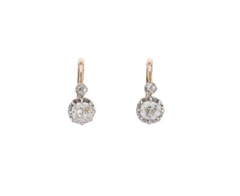 A pair of late 19th century gold old-cut diamond earrings, with rose-cut diamond surmount and hinged back fittings, estimated