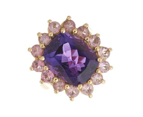 An 18ct gold cushion-shape amethyst and pink tourmaline cluster ring, amethyst estimated weight 4.75ct, band stamped 18ct, ri