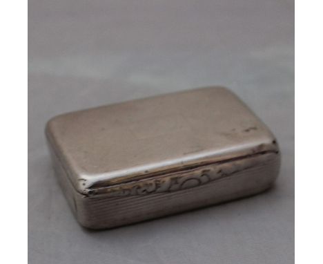 A silver rectangular snuff box, by D. Bros, assayed Birmingham 1960, having hinged lid with shaped and chased thumb grip, wid