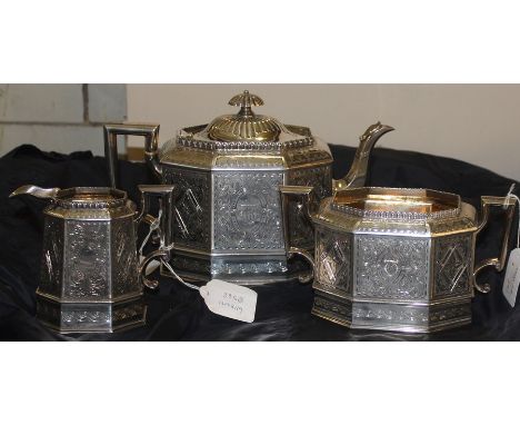 A fine Victorian Scottish three piece silver tea service, by George &amp; Michael Crichton, assayed Edinburgh 1872, of octago