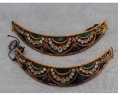 A Turkish yellow metal, enamel and stone set collar set?, of shallow crescent form, decorated with dark green and blue and re