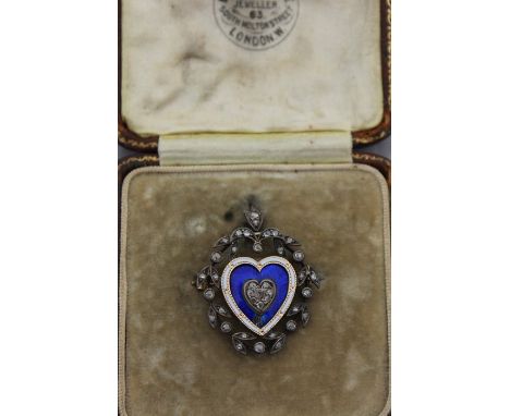 A fine diamond and enamel heart pendant brooch, fashioned from white and yellow metal, having heart to centre set eight rose 