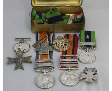 A collection of military medals, including: A Victorian silver Boer war Queens South Africa medal, engraved "28142. Corpl: W.