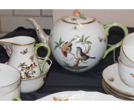 A Herend tea set comprising teapot cups and saucers jug and sugar bowl, perfect condition to all