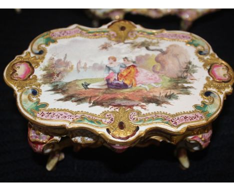 A&nbsp;late 18th century continental porcelain set of hand painted dolls house furniture,&nbsp;probably Marseille, fashioned 