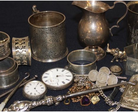 A collection of small silver and items, to include; a silver christening mug, by Lawson, Ward &amp; Gammage, assayed London 1