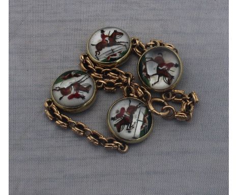 A precious yellow metal Essex crystal bracelet, having four yellow metal set circular reverse intaglio crystal links, each de