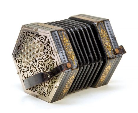 A Charles Jeffries 49 button concertina, having hexagonal ebonised wood and gilt tooled black leather covered ends with pierc