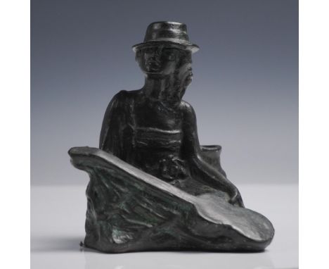 Bronze sculpture by American artist Elsie Palmer Payne (1884–1971), depicting a seated figure wearing a brimmed hat and holdi