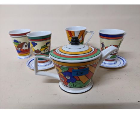 Past Times, Clarice Cliff style ceramics to include a teapot, four mugs and three saucers Location: 