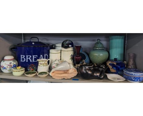 A mixed lot of ceramics to include mixed vases, bread bin, Poole Pottery shell, Carltonware items, glass paper weight and oth