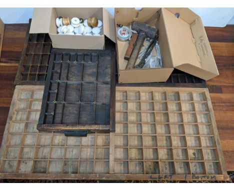 Three printers trays, tools and twenty four ceramic knobs. LOCATION: 