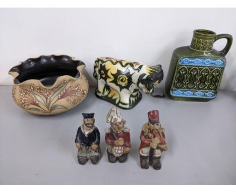 Mixed studio pottery items to include a Celtic Pottery model of a cow, three Tremar figures, a Price Kensington Piraeus vase,