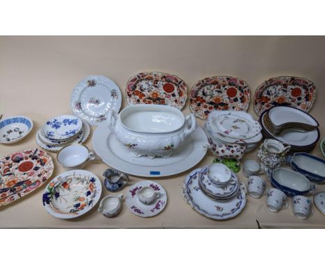 A selection of 19th century and later ceramics to include four Imari style serving dishes, Limoges meat platter with crest, f