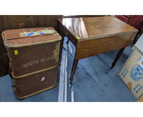 An early 19th century mahogany Pembroke table, 72cm x 91cm, together with a canvas bound trunk and mixed watercolours to incl