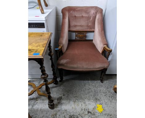 A late Victorian inlaid walnut upholstered chair, button back over a pierced and inlaid centre splat, turned columns and fron