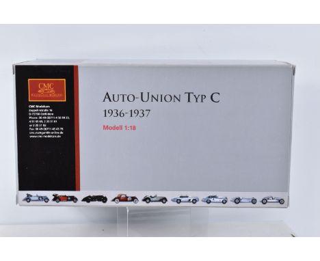 A BOXED CMC AUTO UNION TYP C 1936-1937 1:18 SCALE MODEL, numbered M-034, silvered body, appears brand new with sealed tweezer