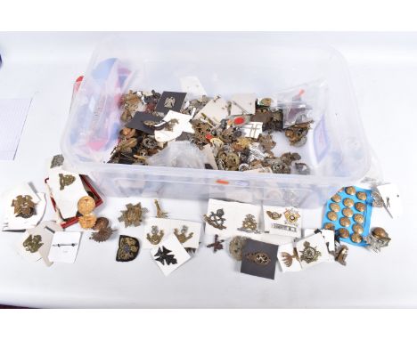 A VAST ASSORTMENT OF MILITARY CAP BADGES, buttons and shoulder titles, the badges include army cycling corps, Liverpool, Scot