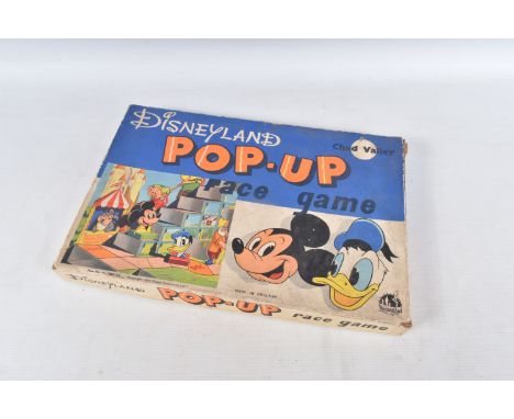 A BOXED CHAD VALLEY DISNEYLAND POP-UP RACE GAME, c.1950's, missing dice but otherwise appears complete with all four characte