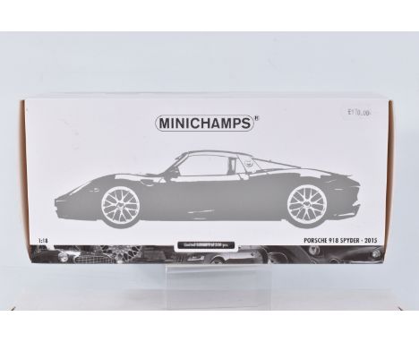 A BOXED LIMITED EDITION MINICHAMPS PORSCHE 918 SPIDER 2015 1:18 SCALE MODEL VEHICLE, numbered 110 062446, yellow body with bl