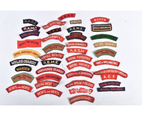 A COLLECTION OF WWII ERA UNIFORM CLOTH SHOULDER TITLES, this was part of the collection that was given to V.A.D nurse Jess Wi