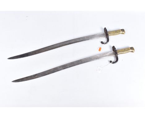 TWO FRENCH M1866 BAYONETS, neither have a scabbard and there are faint markings on the blades, the cross guards are numbered 