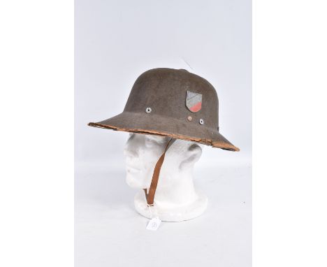 A 1942 DATED GERMAN ARIKACORPS PITH HELMET WITH DECALS, this is the olive green tropical sun hat with metal army and national