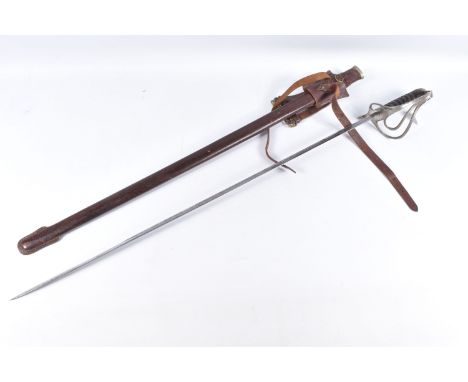 A TWENTIETH CENTURY OFFICERS CAVALRY SWORD, this has a highly decorated blade and a proof mark within a six pointed star, it 