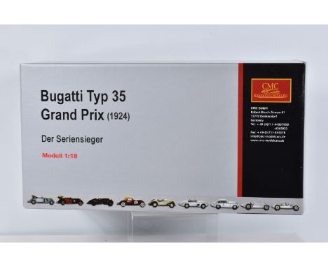 A BOXED CMC BUGATTI TYP 35 GRAND PRIX 1924 1:18 SCALE MODEL, numbered M-063, blue body appears in brand new condition with se