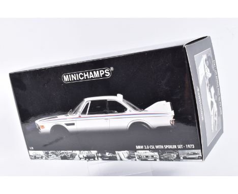 A BOXED MINICHAMPS BMW 3.0 CSL WITH SPOILER SET 1973 1:18 SCALE MODEL VEHICLE, numbered 180 029021, white body with red, blue