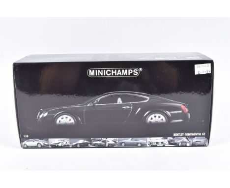A BOXED MINICHAMPS BENTLEY CONTINENTAL GT 1:18 SCALE MODEL VEHICLE, numbered 100 139020, black body, appears brand new in its