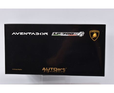 A BOXED AUTOART SIGNATURE MODEL LAMBORGHINI AVENTADOR LP700-4, 1:18 scale, numbered 74668, in verde ithaca green, appears in 