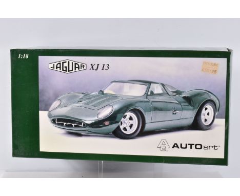 A BOXED AUTOART JAGUAR XJ 13 1:18 SCALE MODEL, numbered 73541, in green, model appears brand new inside its polystyrene packa