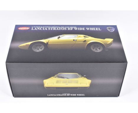 A BOXED KYOSHO LANCIA STRATOS HF WIDE WHEEL 1:18 SCALE MODEL VEHICLE, numbered 08137Y, in yellow signed Trato to each side, a