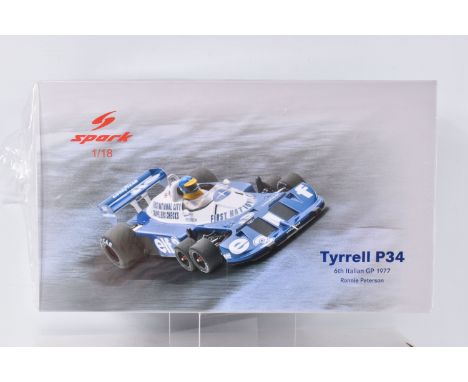 A SEALED SPARK TYRRELL P34 6TH ITALIAN GP 1977 RONNIE PETERSON 1:18 SCALE RACE CAR, numbered 18S573, with original platic wra