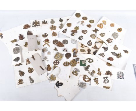 A LARGE ASSORTMENT OF BRITISH AND COMMONWEALTH CAP BADGES AND COLLAR BADGES, these include Royal Military School, British Arm