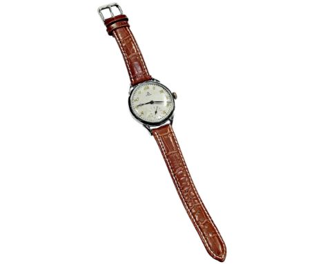 Omega. A gentleman’s vintage wristwatch, the silvered dial with golden Arabic numerals and subsidiary seconds dial, 40mm case
