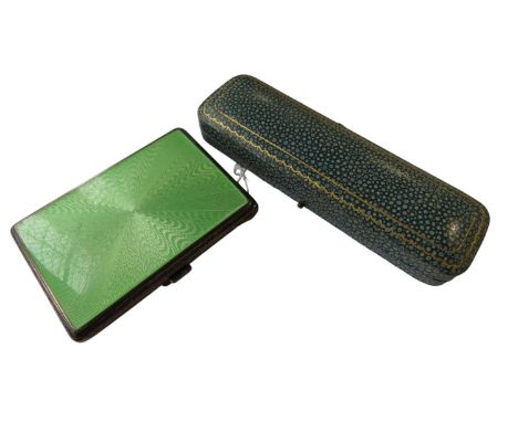 An Art Deco 925 silver cigarette case with lime green enamel casework and a further blue enamelled cigarette holder (lacks st