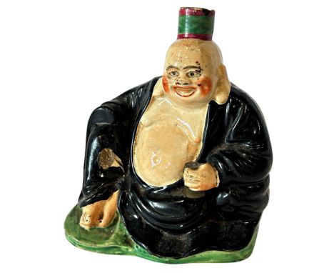 A 19th century Staffordshire earthenware spirit flask in the form of Buddha, a 19th century Staffordshire type figure of a ch