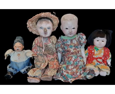 Four character dolls comprising a pair of early 20th century oriental dolls with paper mache / composition heads and wooden l