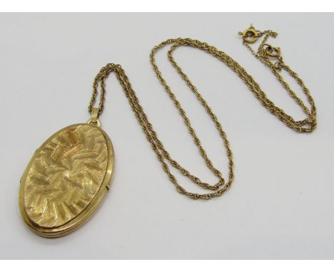 Vintage 9ct oval locket pendant necklace, locket maker 'MWLd', London 1968, the rope twist chain 57cm L approx, 22.9g (gross 